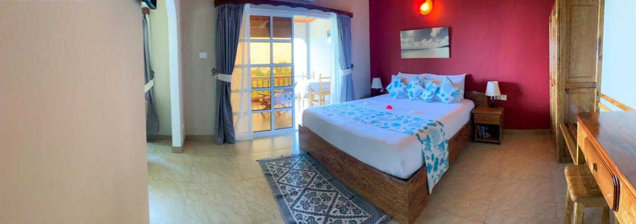 Exotic Guest House Anse Volbert Village  Bagian luar foto
