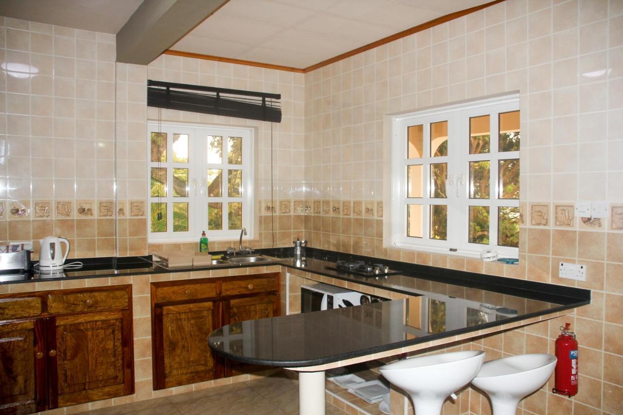Exotic Guest House Anse Volbert Village  Bagian luar foto